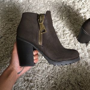 Brown suede shoes by soda